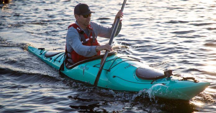 ken whiting using the pakayak bluefin 142 portable kayak sunset photography paddling kayaking for beginners