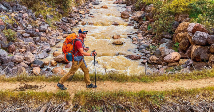 mystery ranch bridger 65l eric in peru by a river backpackingtv